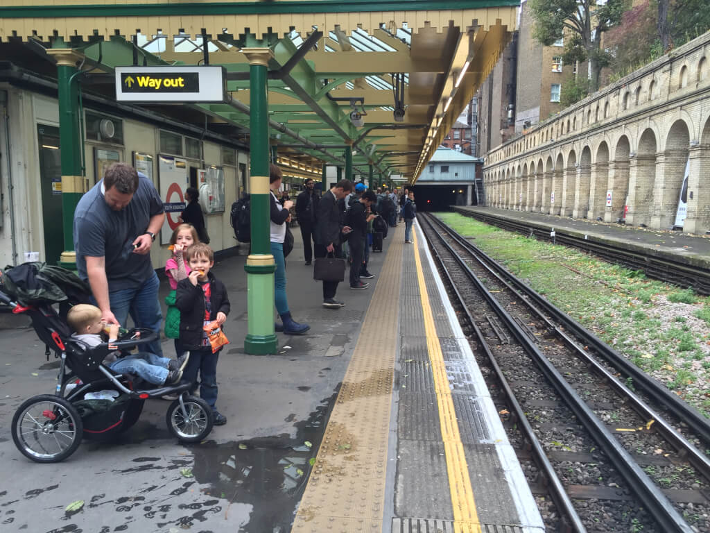 Having a quick snack while waiting at the South Kensington Station.