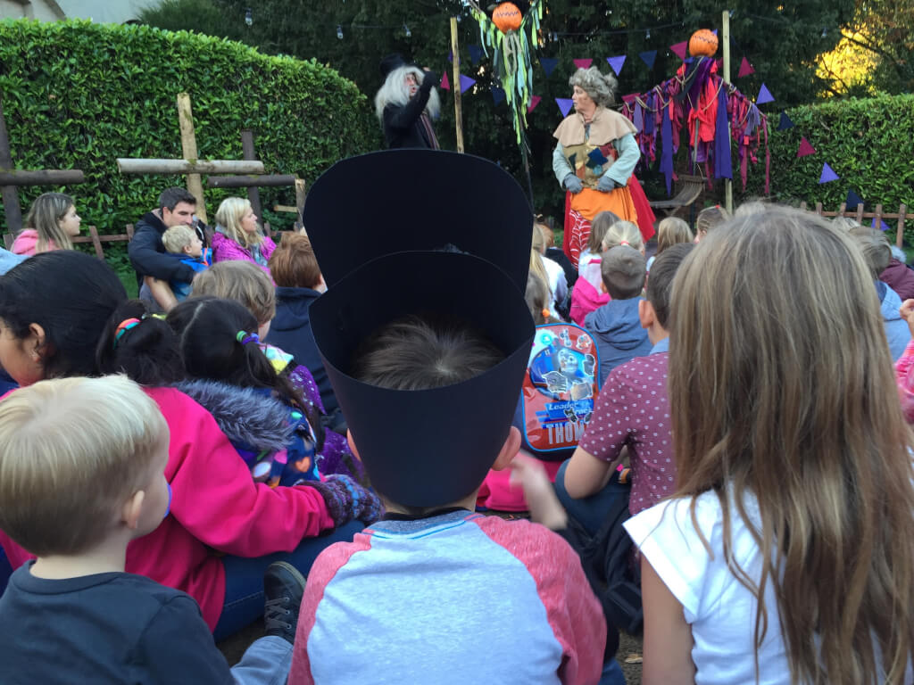 The kiddos listening to stories about the castle's history.