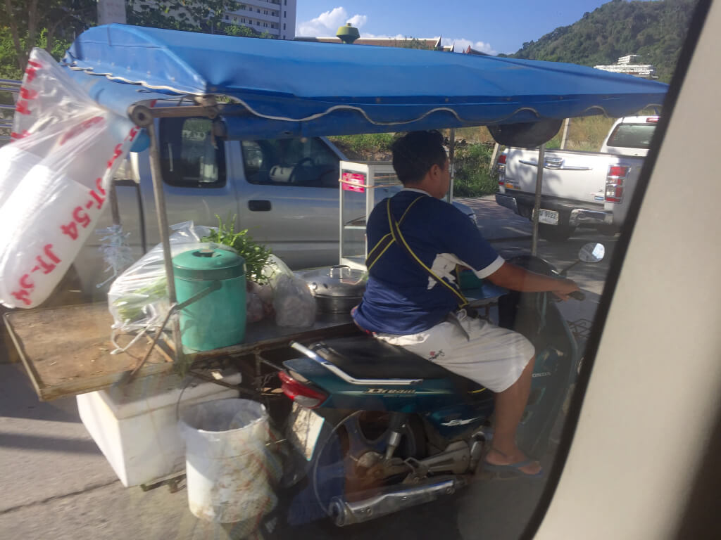 A lot of shops were attached to people's scooters.